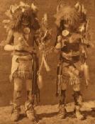 Zuni dancers: detail of
        photograph by Edward Curtis: 1914, [public domain]